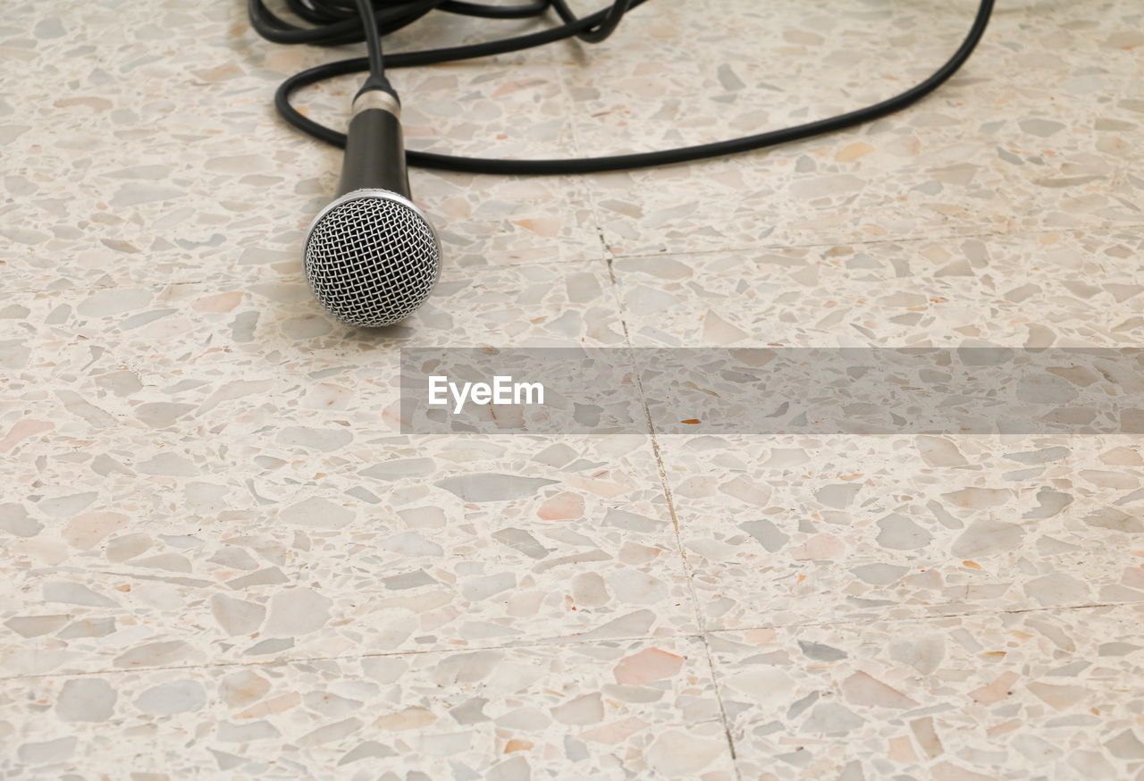 High angle view of microphone on floor