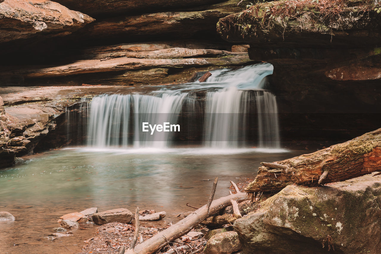 Scenic view of waterfall in forest