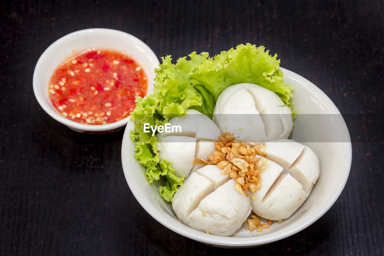 HIGH ANGLE VIEW OF FOOD SERVED ON TABLE