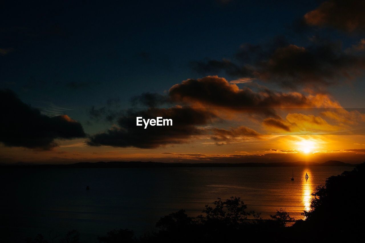 Scenic view of sea against sky during sunset