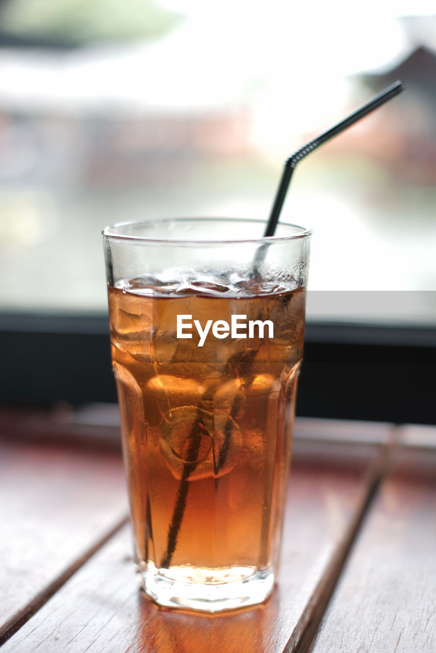 close-up of beer in glass on table