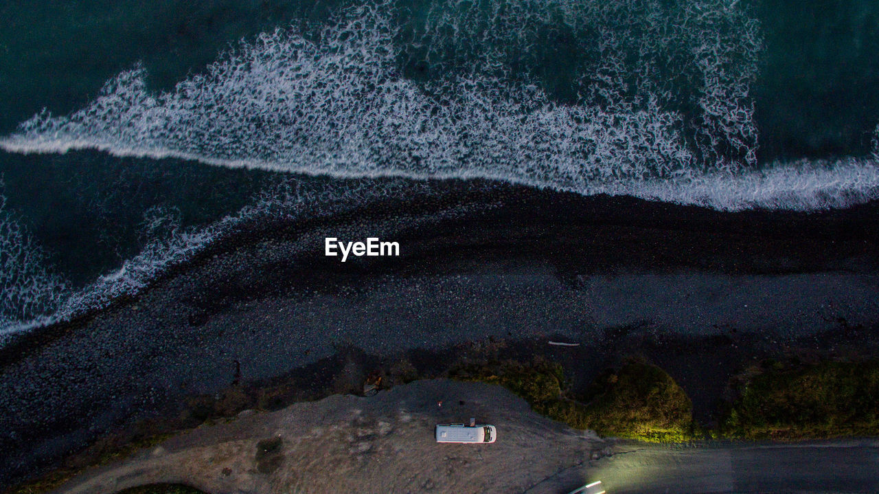 Aerial view of beach during sunset