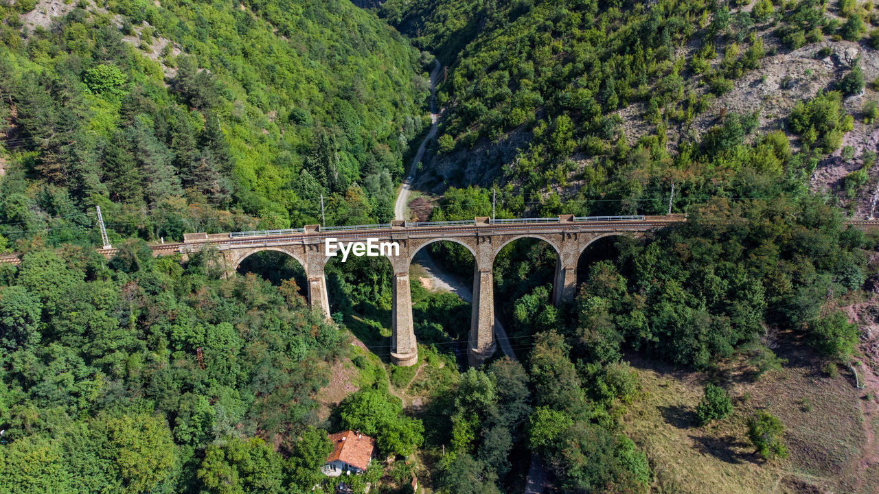 Railway arch bridge over river