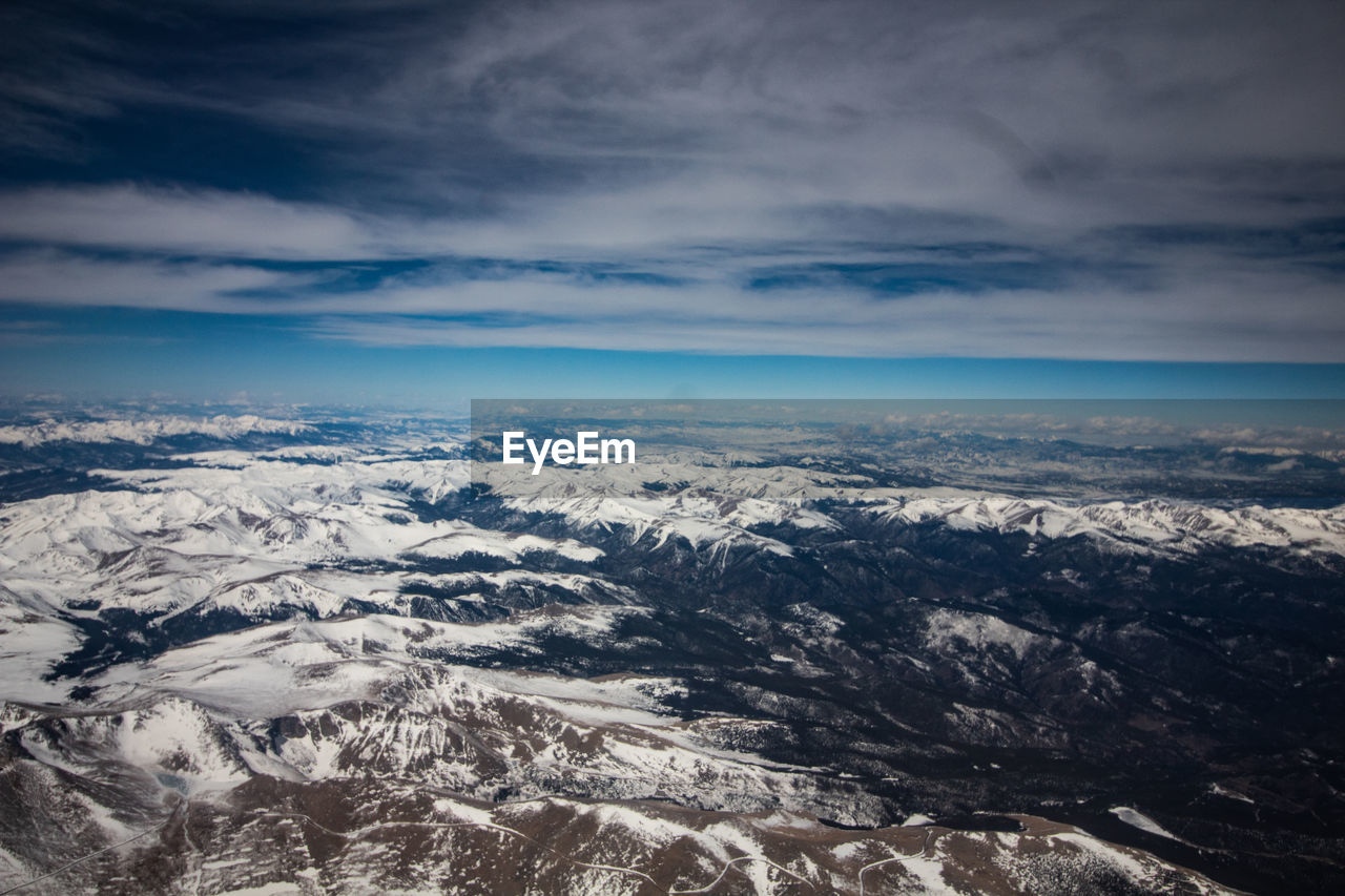 SCENIC VIEW OF DRAMATIC SKY OVER MOUNTAINS