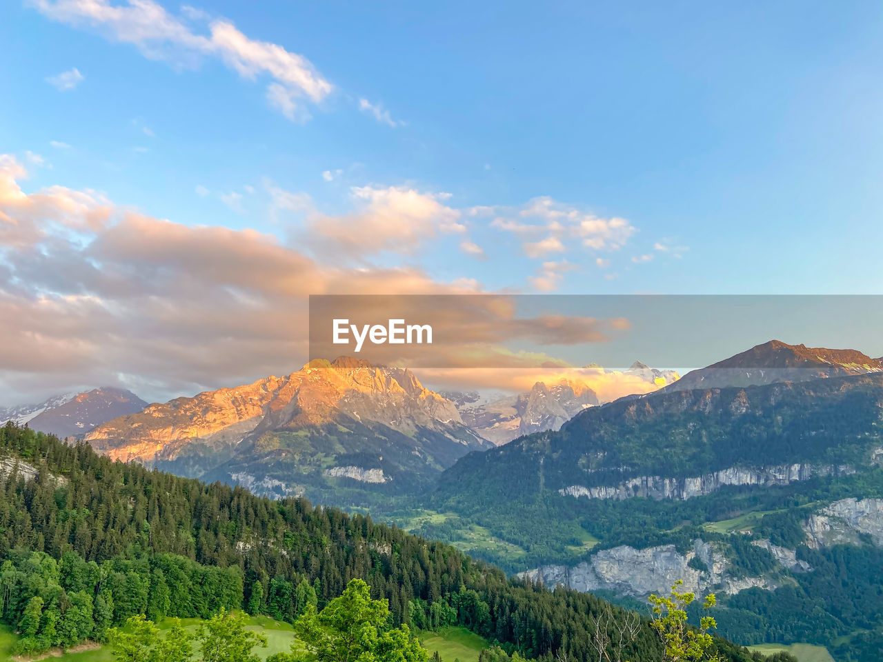 Scenic view of mountains against sky during sunset