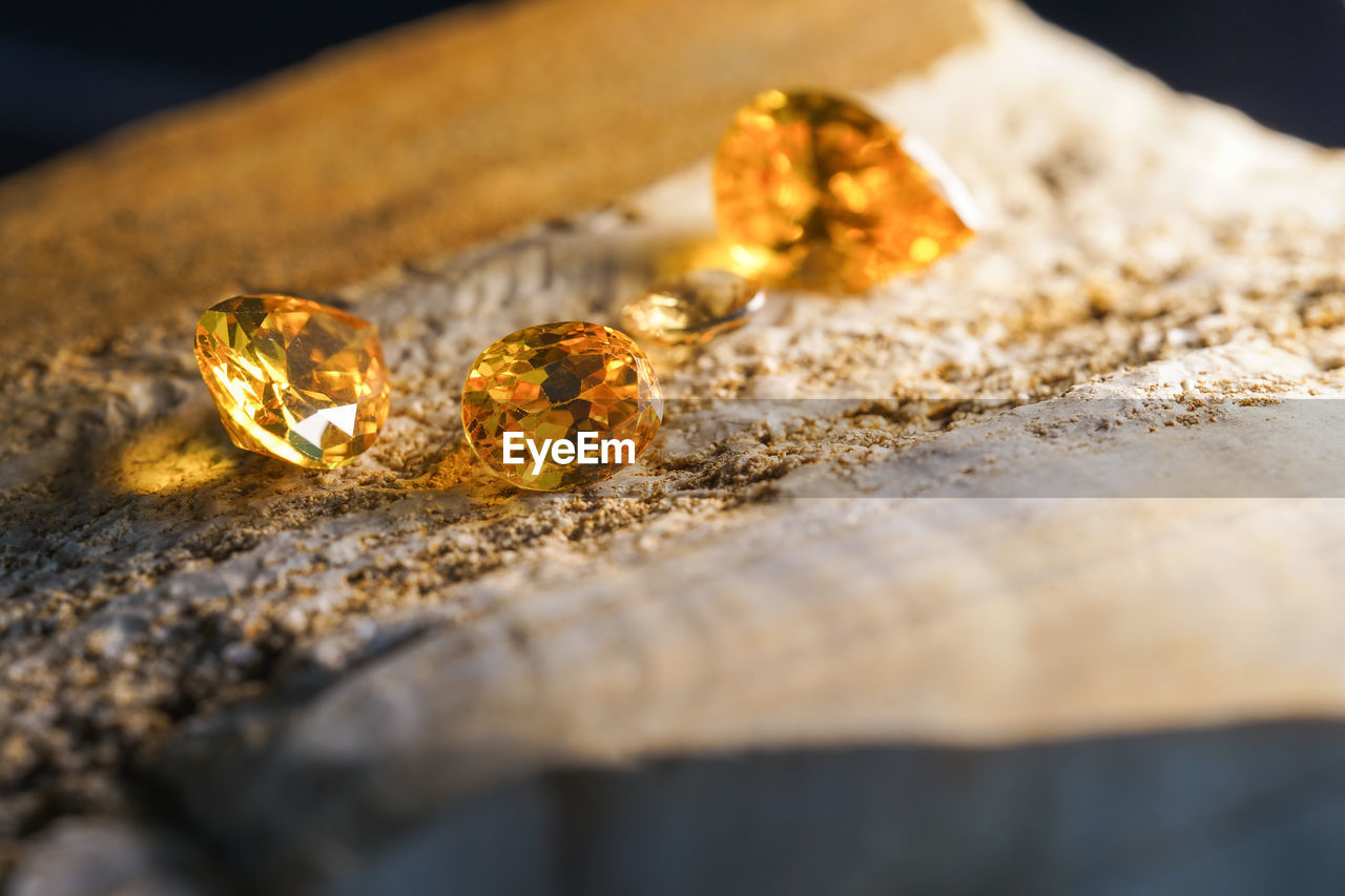 close-up of wedding rings on table