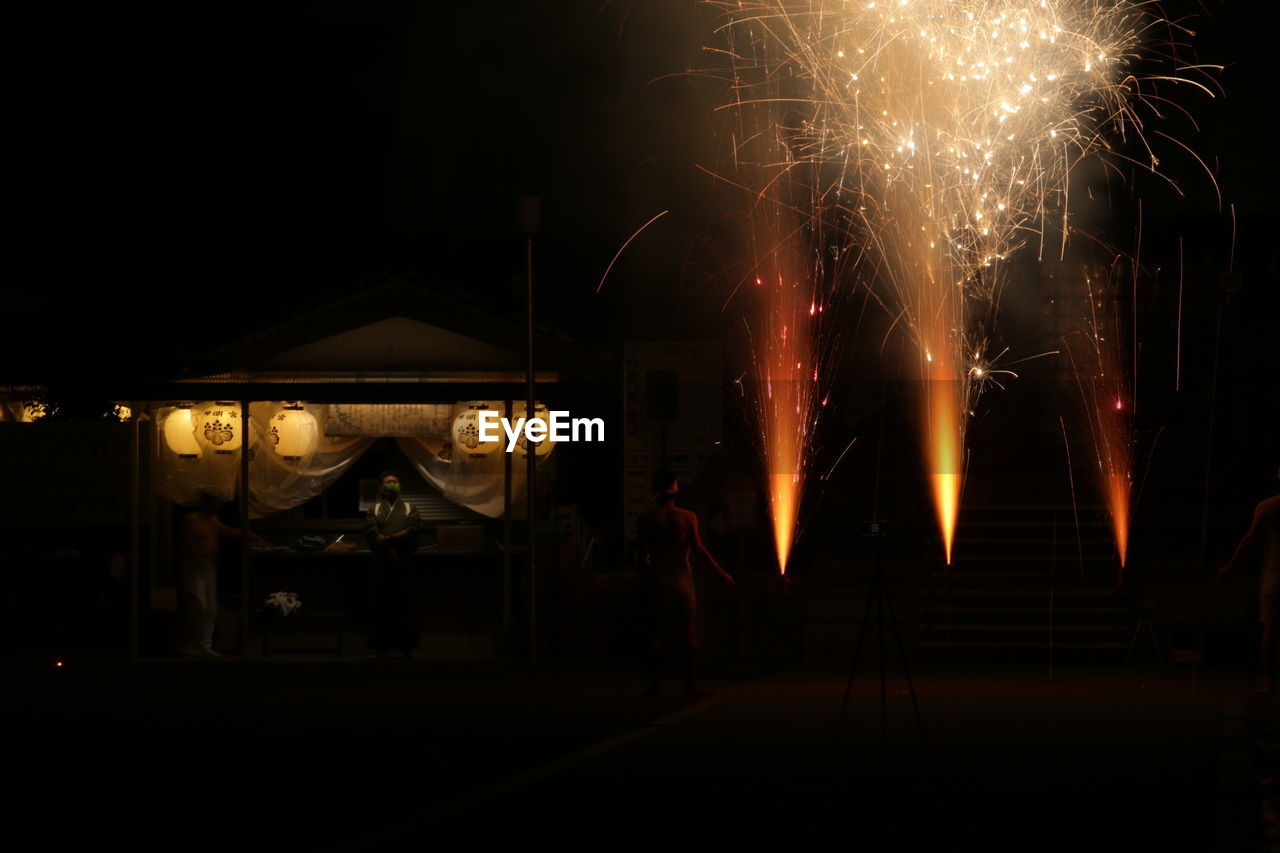 FIREWORK DISPLAY IN SKY AT NIGHT