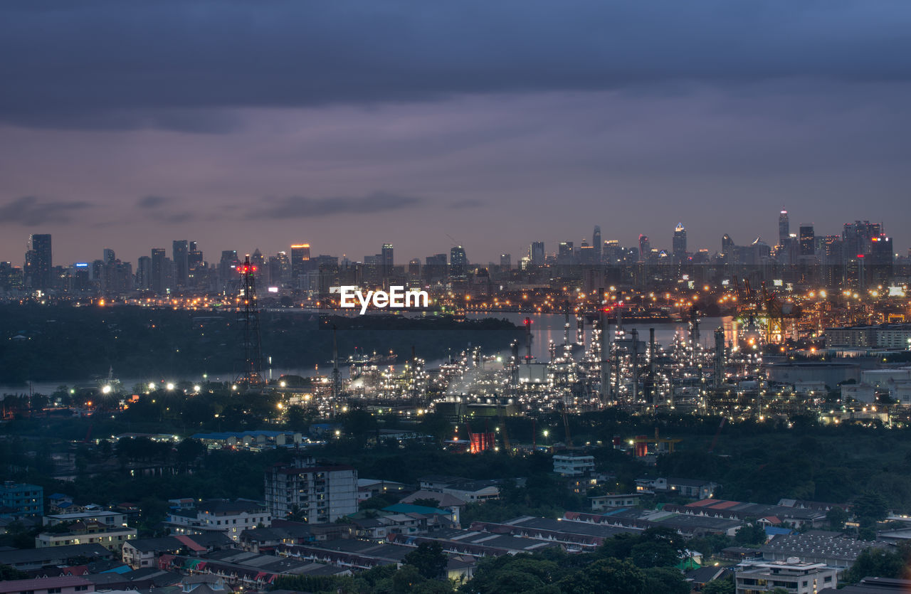 High angle view of illuminated city buildings at night