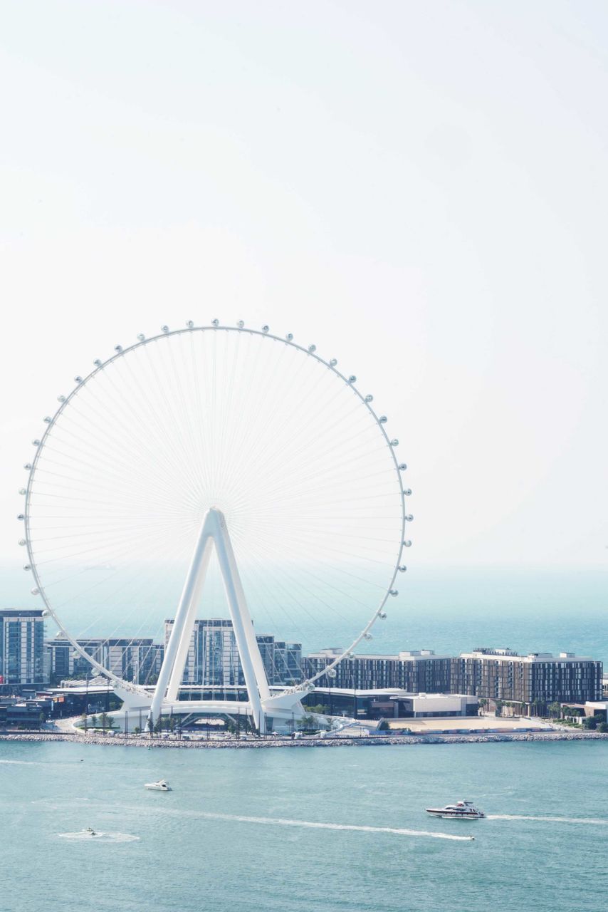 Dubai eye ferris wheel against blue sky
