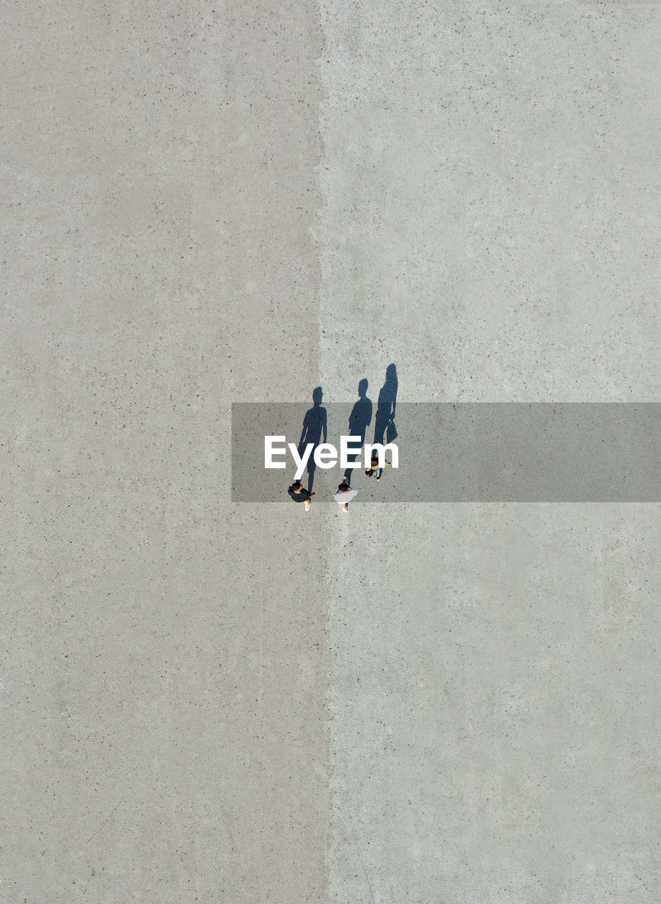 Aerial view of people standing on beach