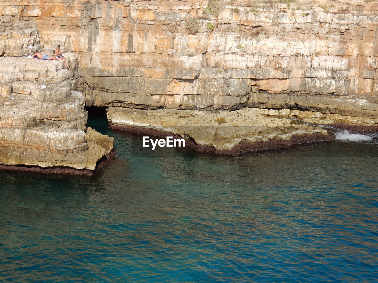 Scenic view of rock formation in sea