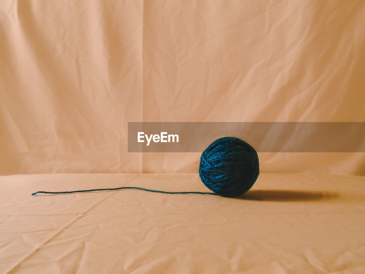 Close-up of wool ball on table