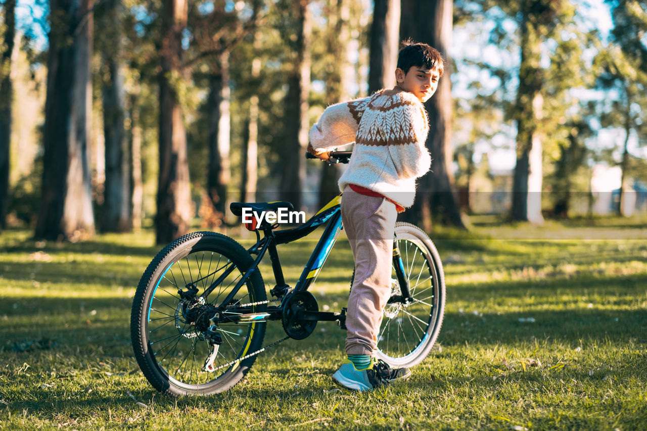 Portrait of child with a bicycle