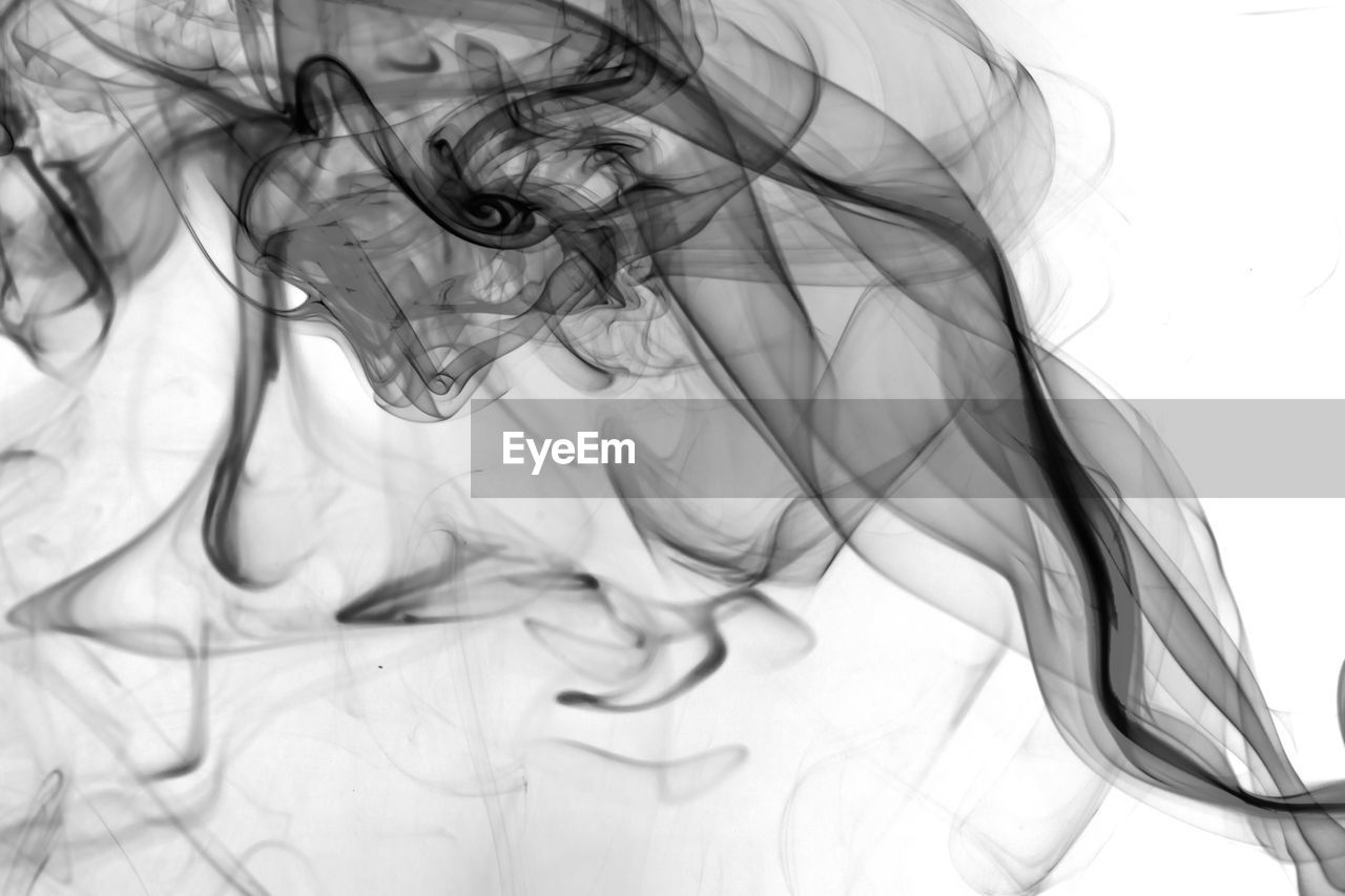 Close-up of smoke against white background