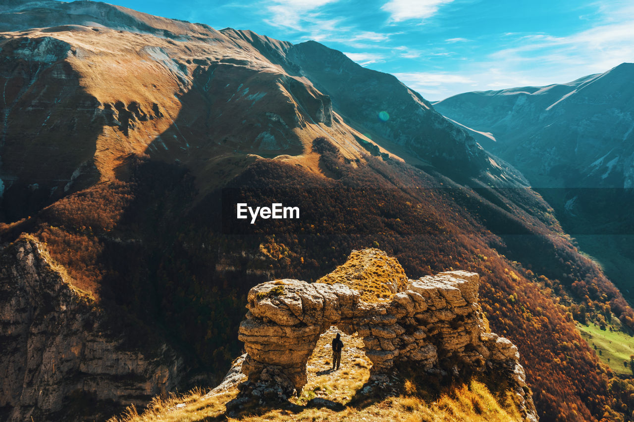 VIEW OF ROCK FORMATIONS AGAINST SKY