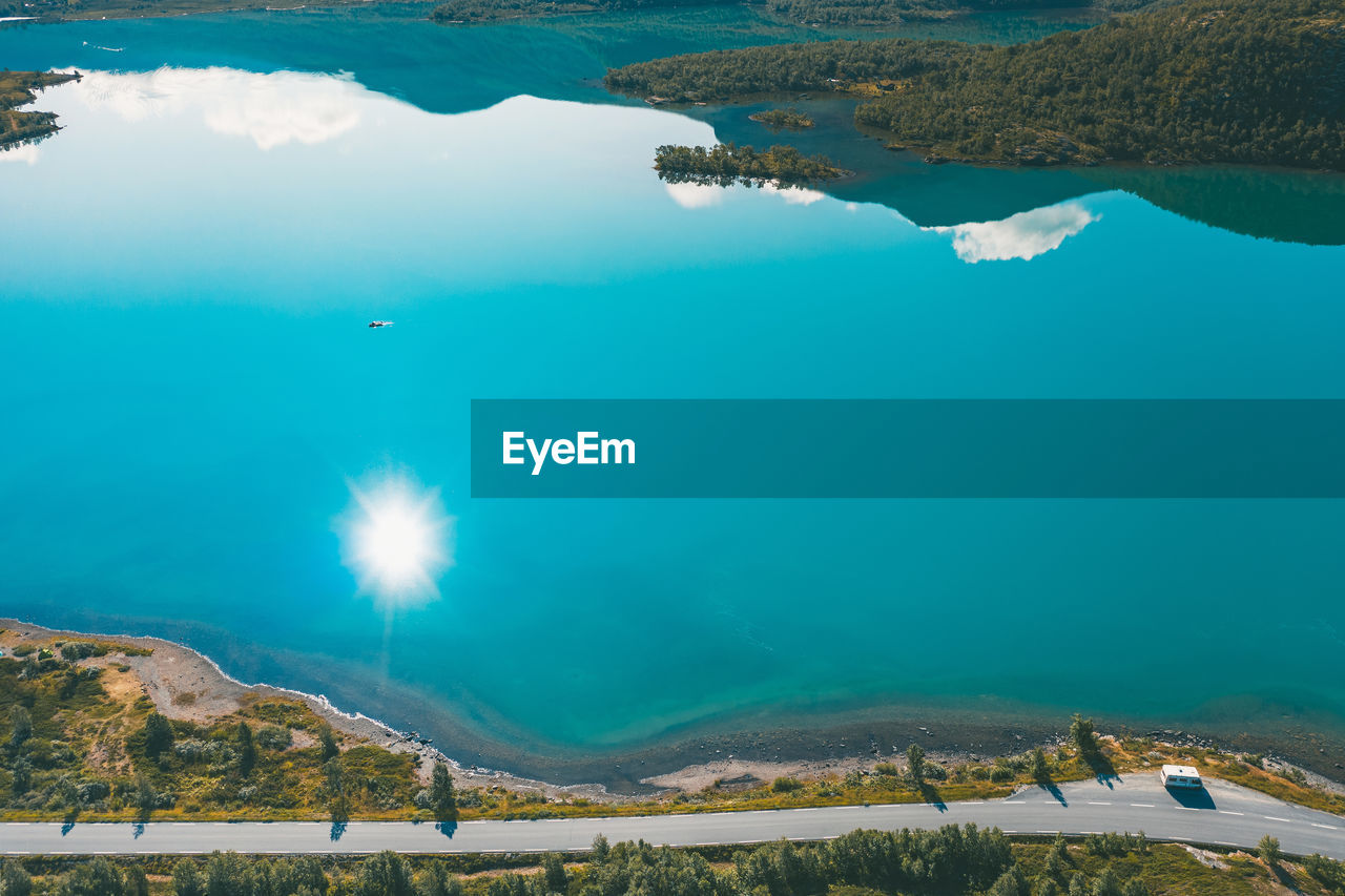 Aerial view of lake and road