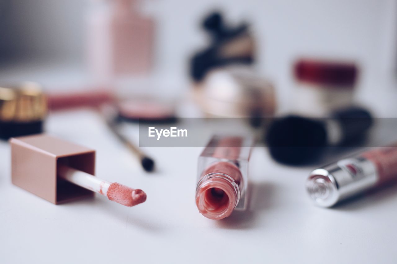 indoors, pink, red, hand, lip, human eye, cosmetics, close-up, table, healthcare and medicine, nail, focus on foreground, make-up, lipstick, still life, blood