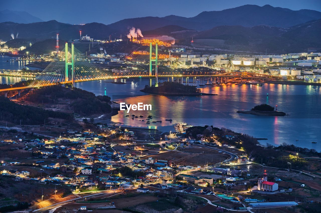 Illuminated cable-stayed bridge in city