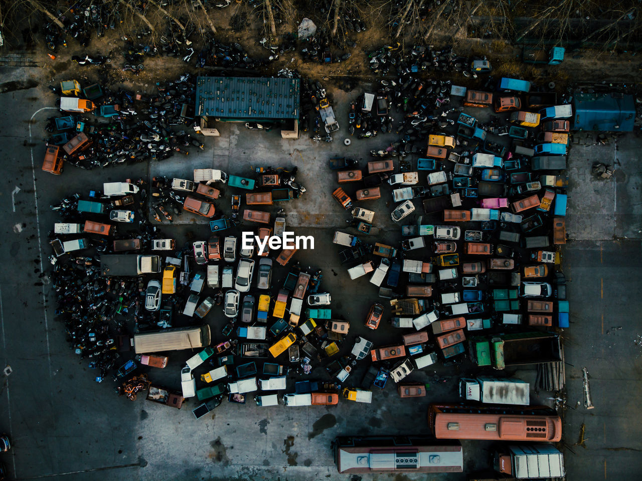 Aerial view of vehicles parked in parking lot