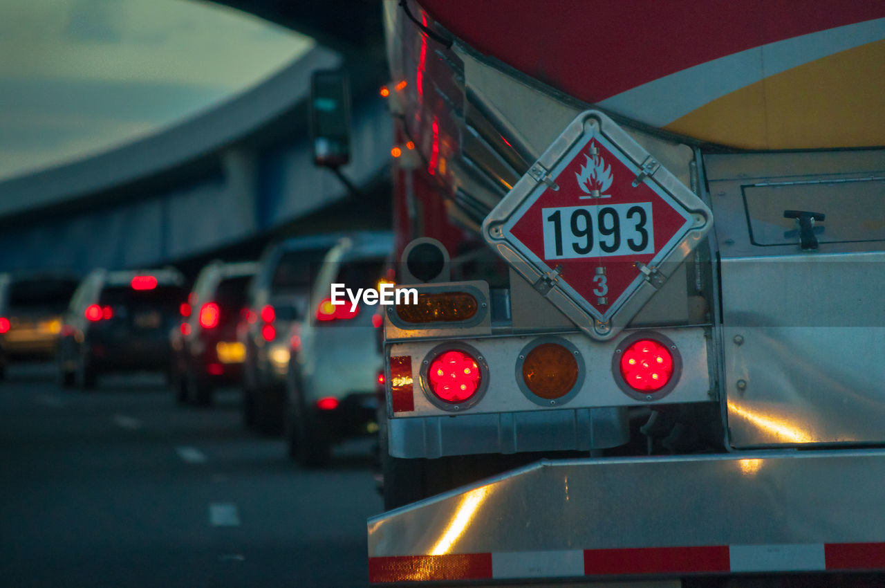 Warning sign on truck in city