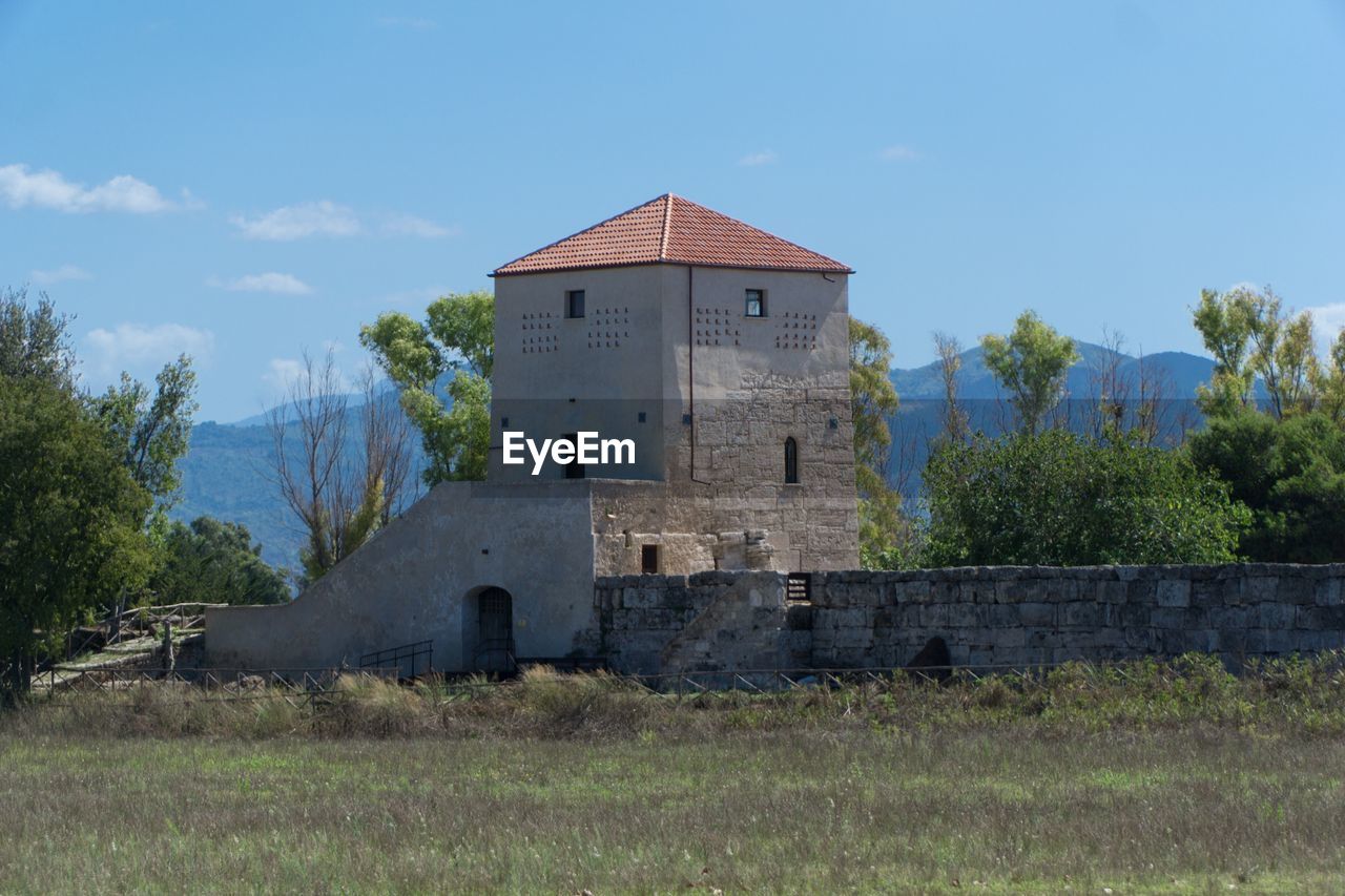 OLD BUILDING AGAINST SKY