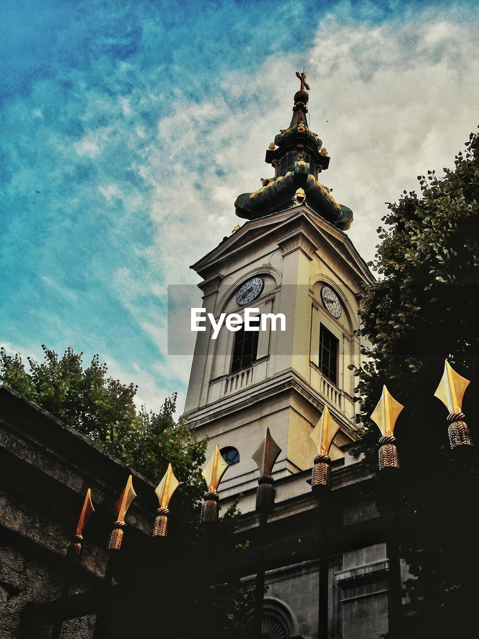 Low angle view of church tower against sky