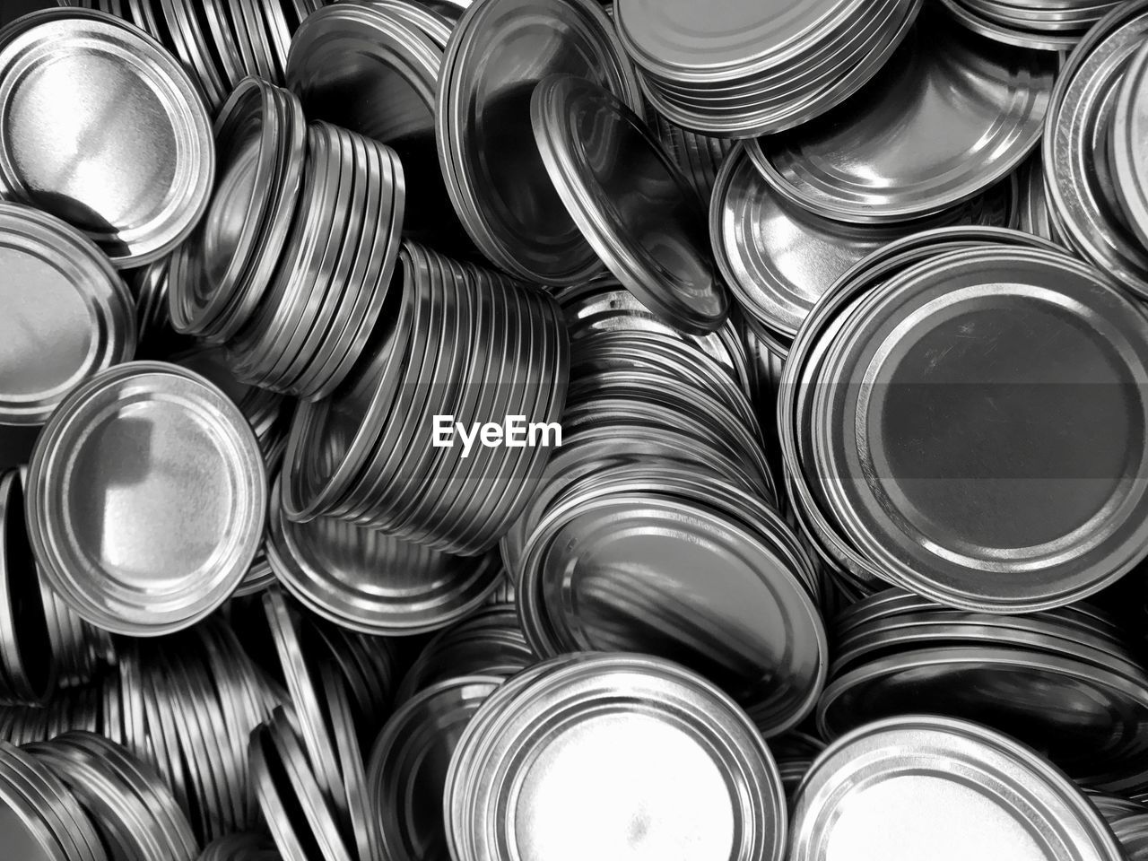 Full frame shot of tin lids for cans