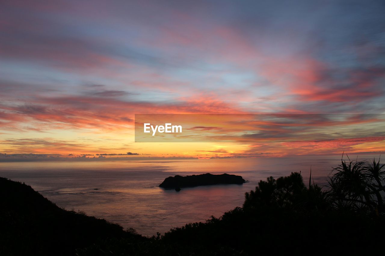 Scenic view of sea against sky during sunset