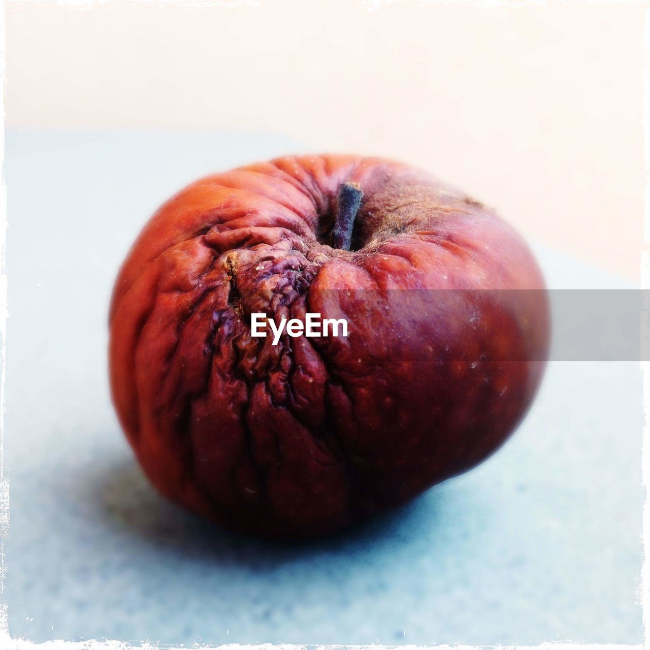 Close-up of apple against white background