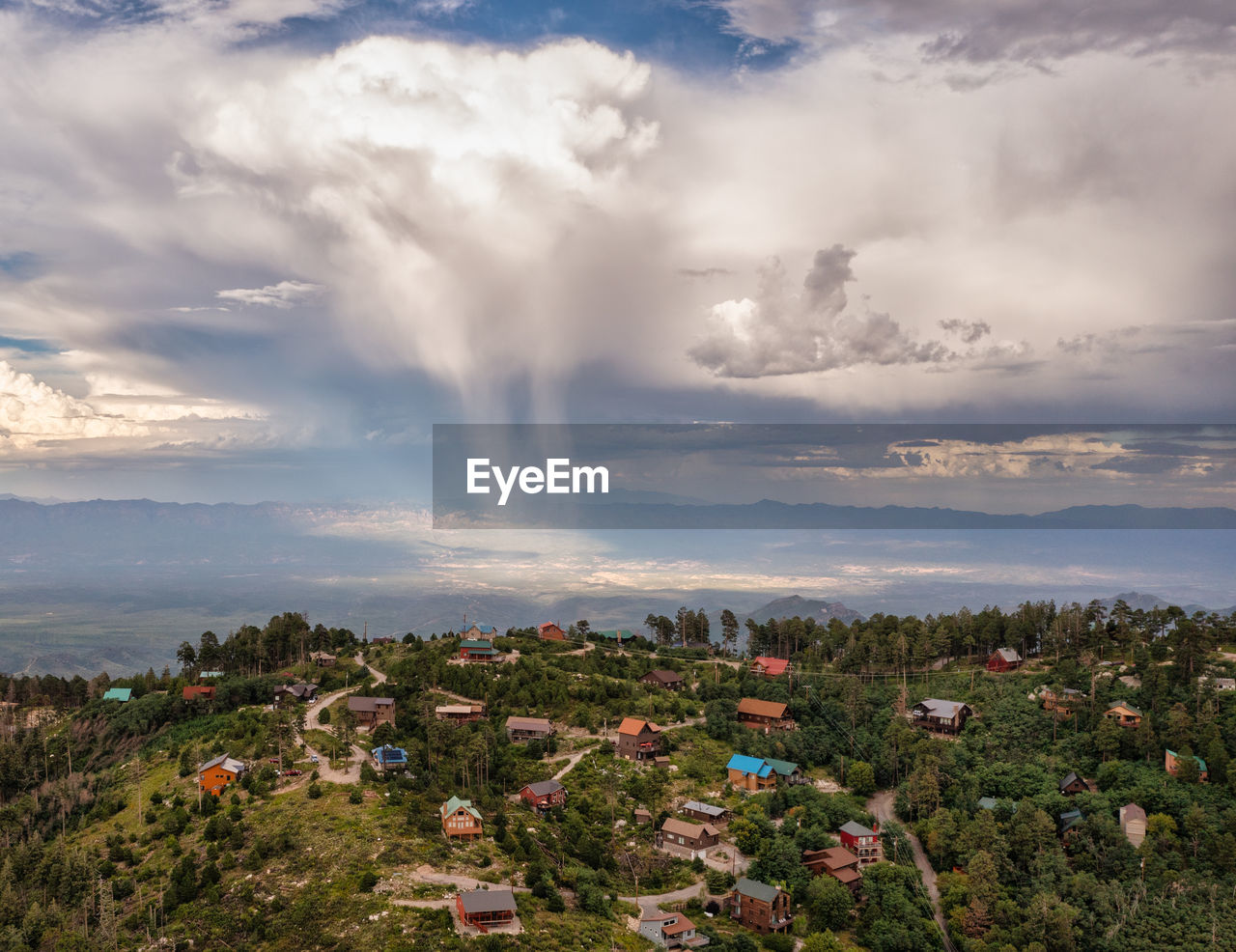 Summerhaven, a small town on top of mt. lemmon, arizona. monsoon rain in distance. aerial photo.