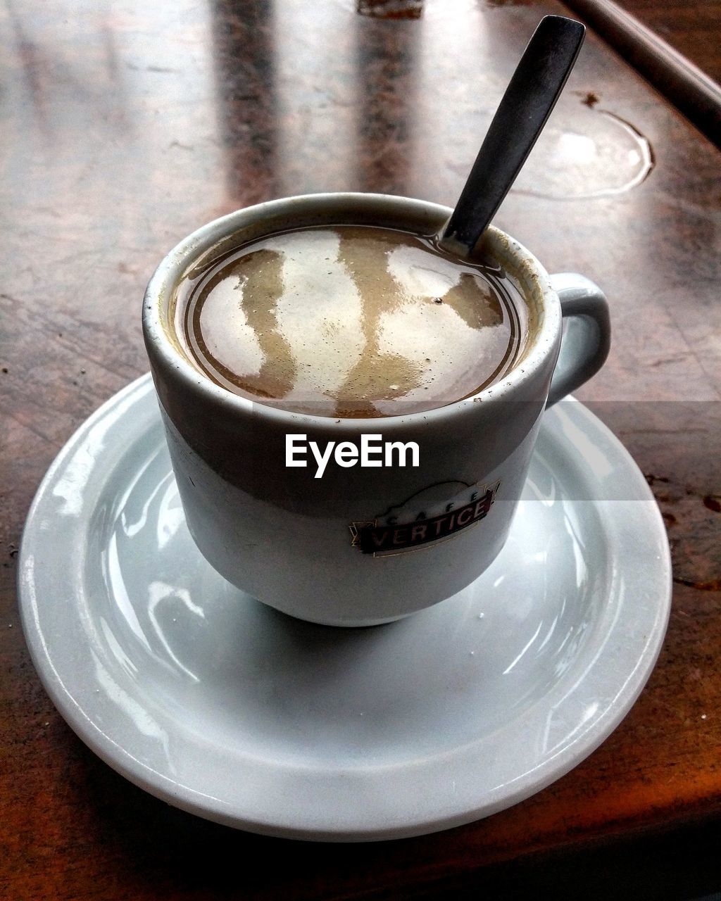 Close-up of coffee cup on table