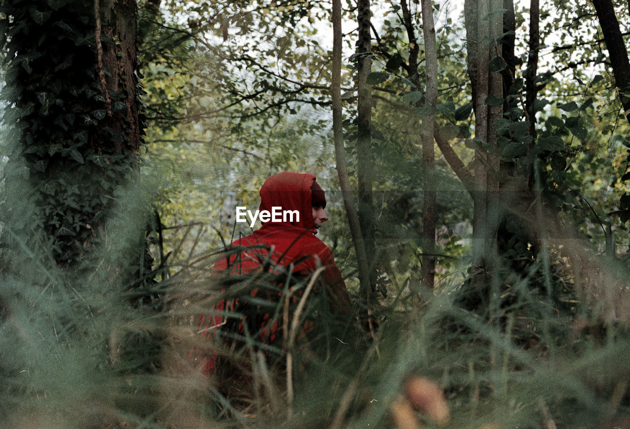 Woman sitting in a forest