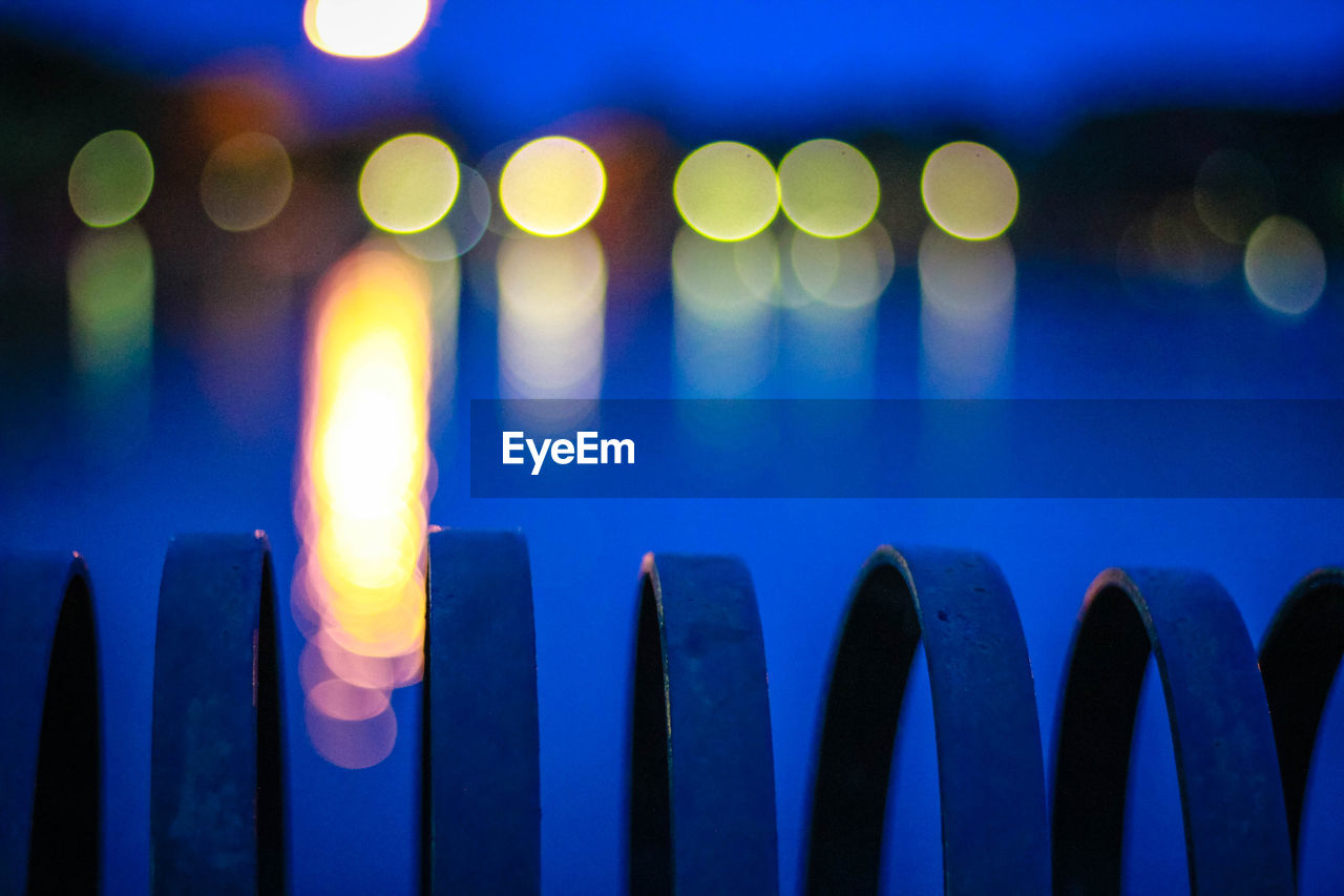 Defocused image of illuminated lights at night