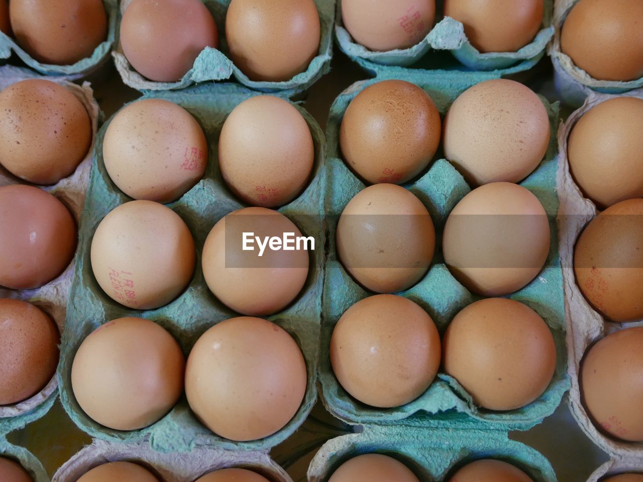 Full frame shot of eggs in crate