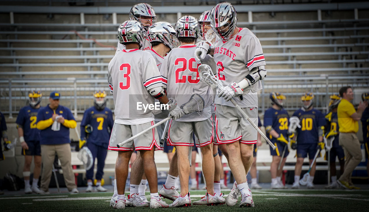 lacrosse, sports, group of people, full length, adult, athlete, clothing, cooperation, young adult, player, stadium, men, ball game, teamwork, competition, soccer, team sport, team, championship