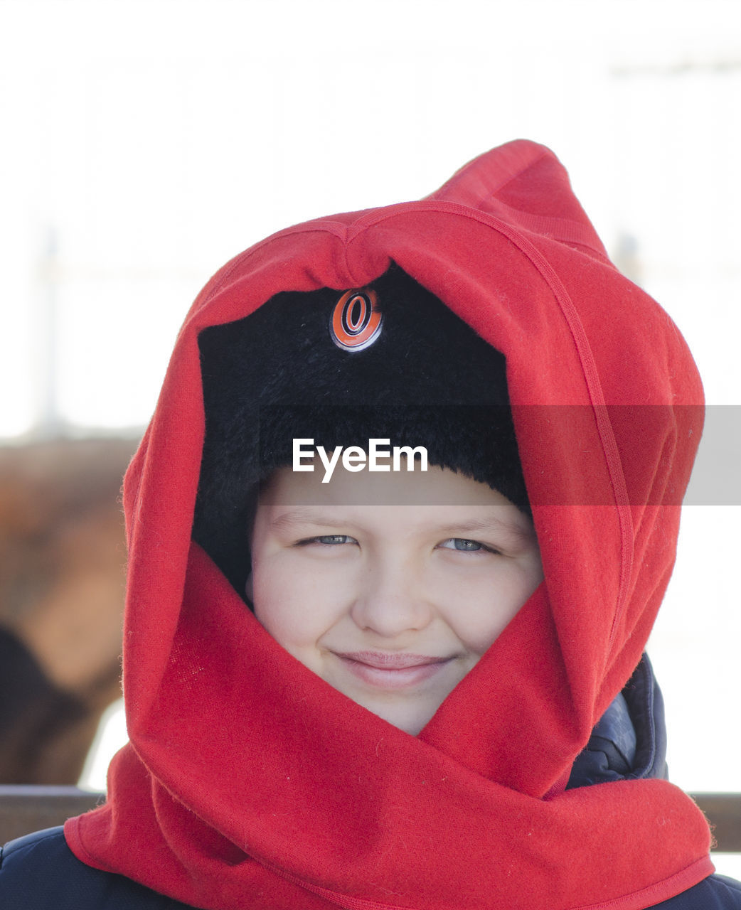 Portrait of smiling boy wearing warm clothing outdoors