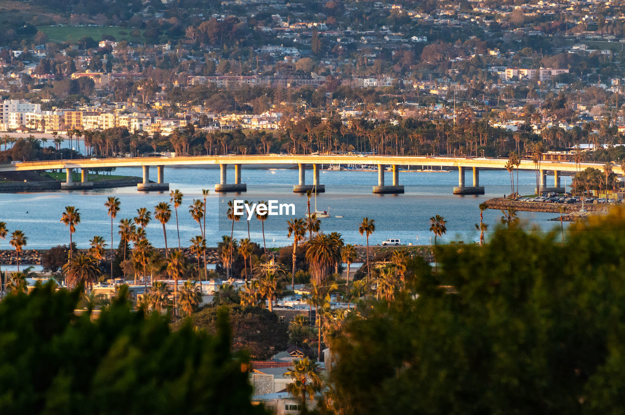 High angle view of cityscape by lake