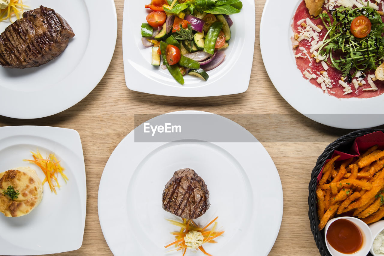 Directly above shot of food served on table