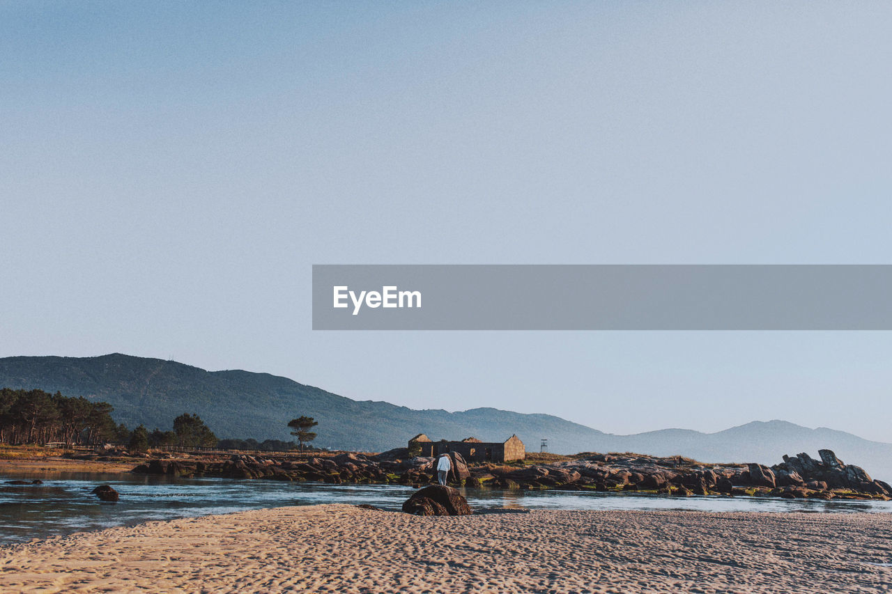 Scenic view of sea against clear sky