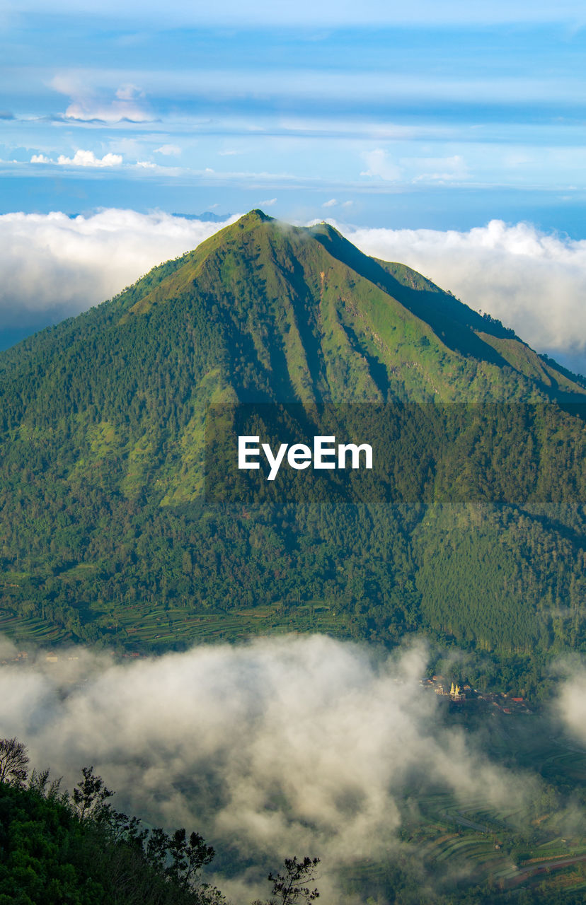 Scenic view of volcanic mountain against sky