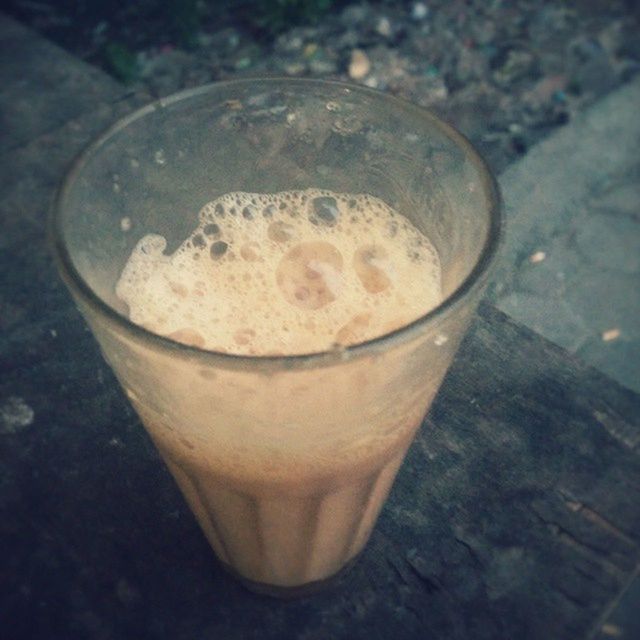 CLOSE-UP OF DRINK ON TABLE