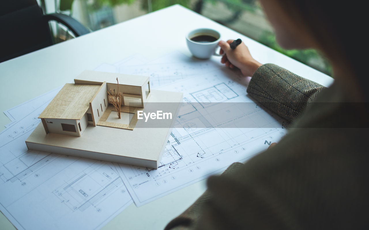 High angle view of person working on table