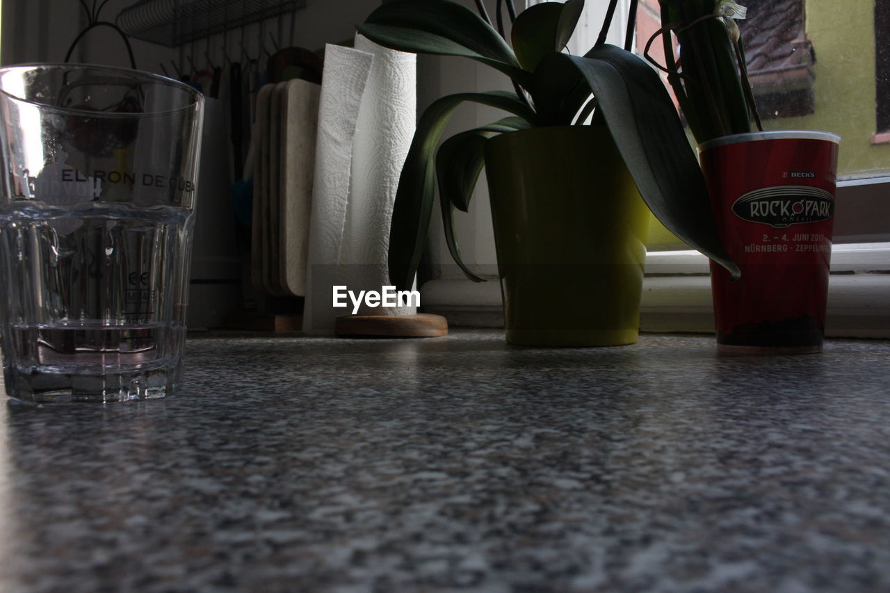 CLOSE-UP OF BEER ON TABLE