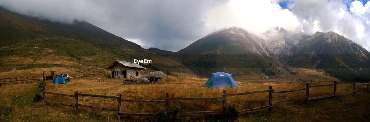 PANORAMIC VIEW OF LANDSCAPE AND MOUNTAIN AGAINST SKY