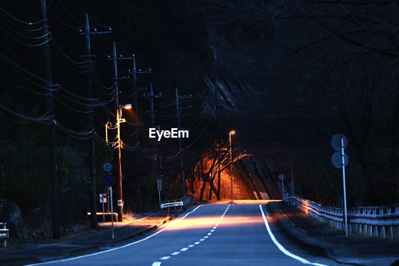 Light trails on road at night