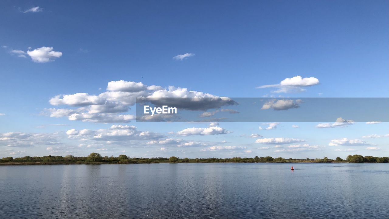 VIEW OF LAKE AGAINST SKY