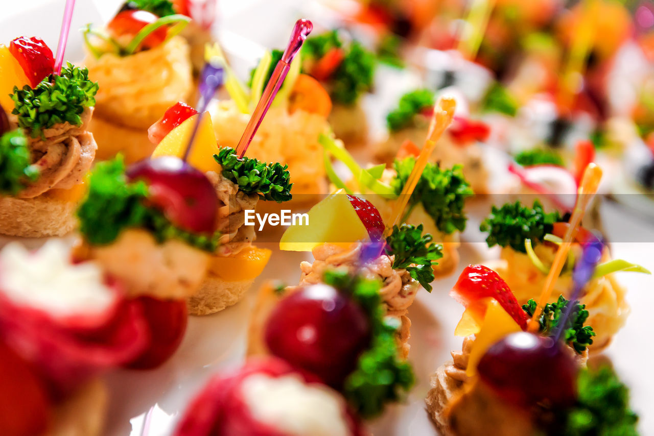 Close-up of various canapes in plate