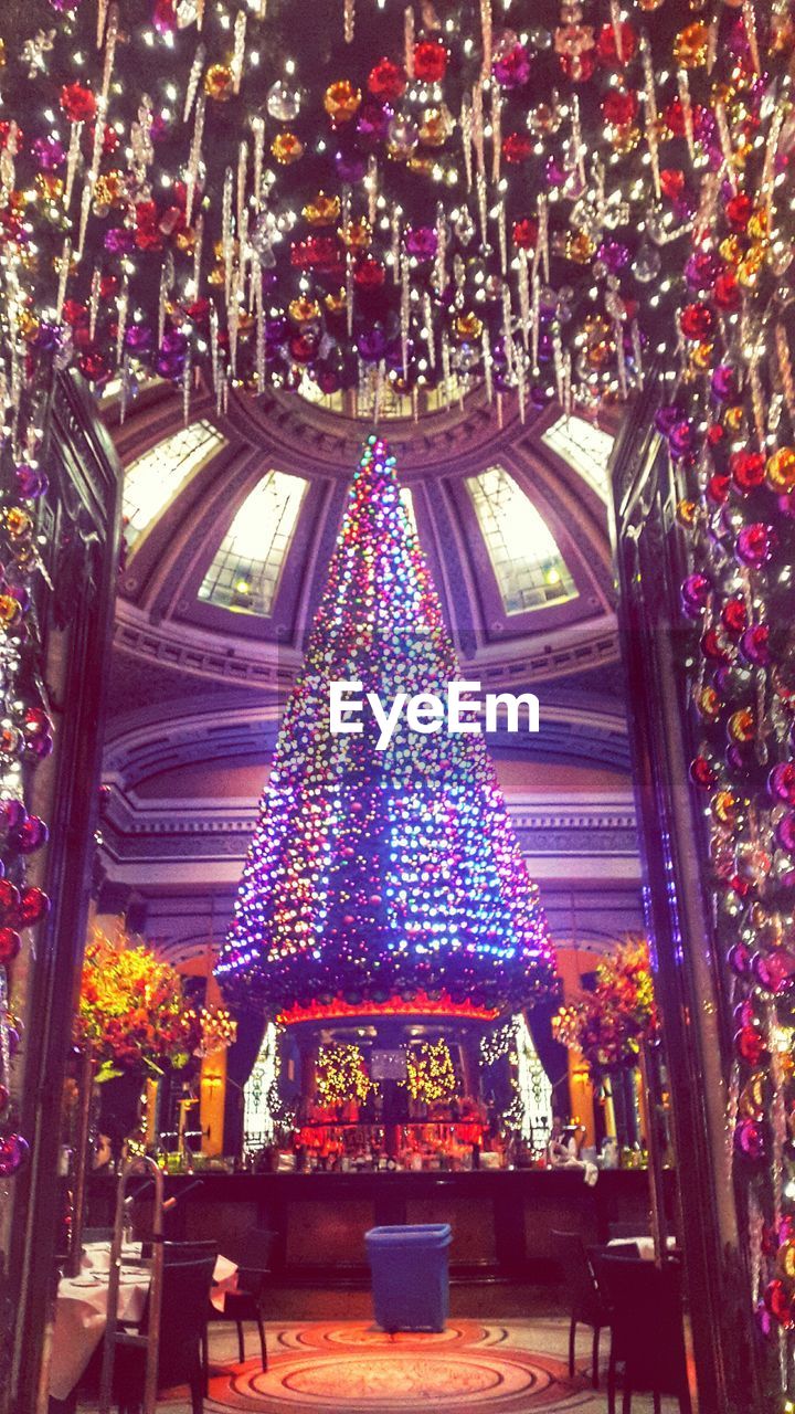 LOW ANGLE VIEW OF TEMPLE AT NIGHT