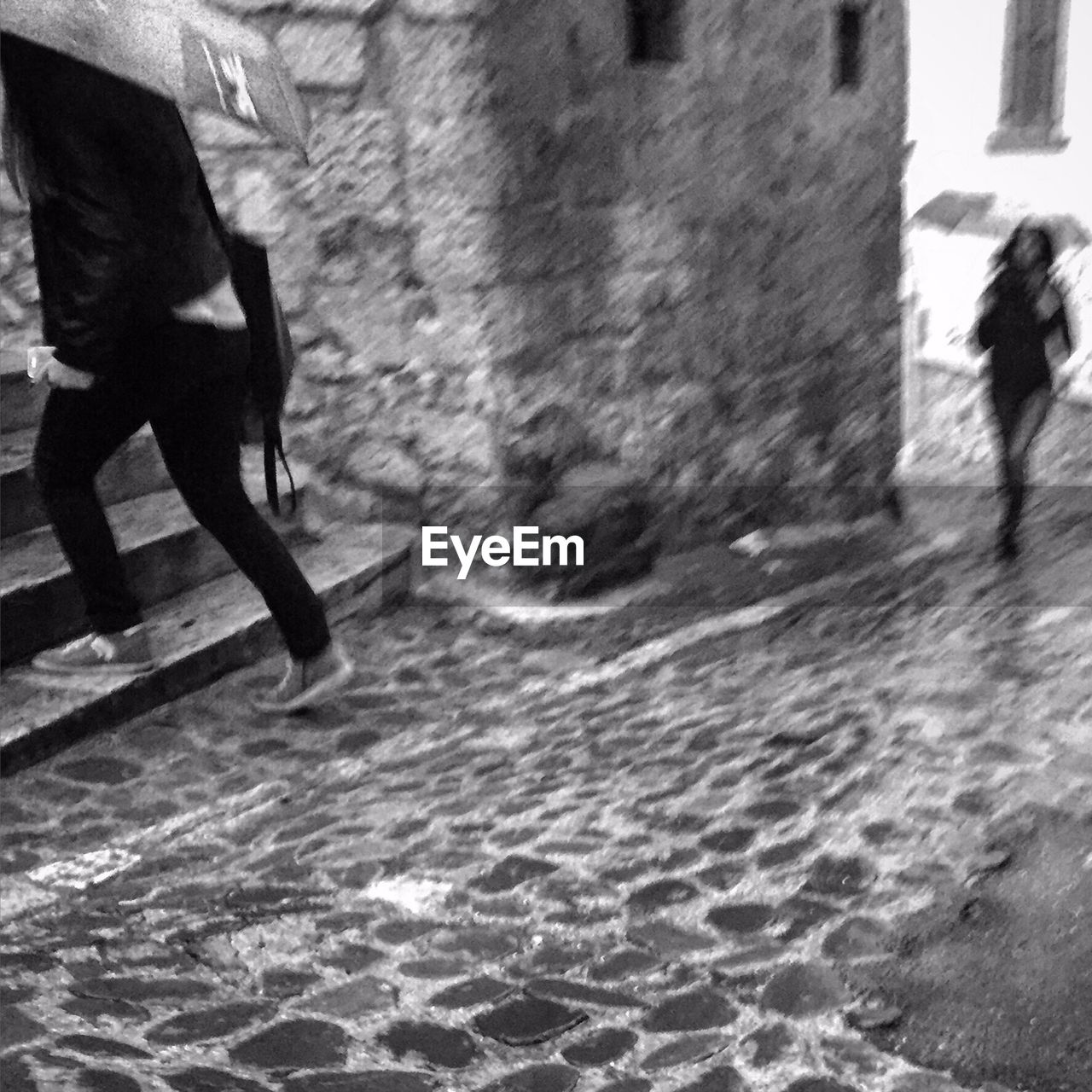 WOMAN STANDING IN WATER
