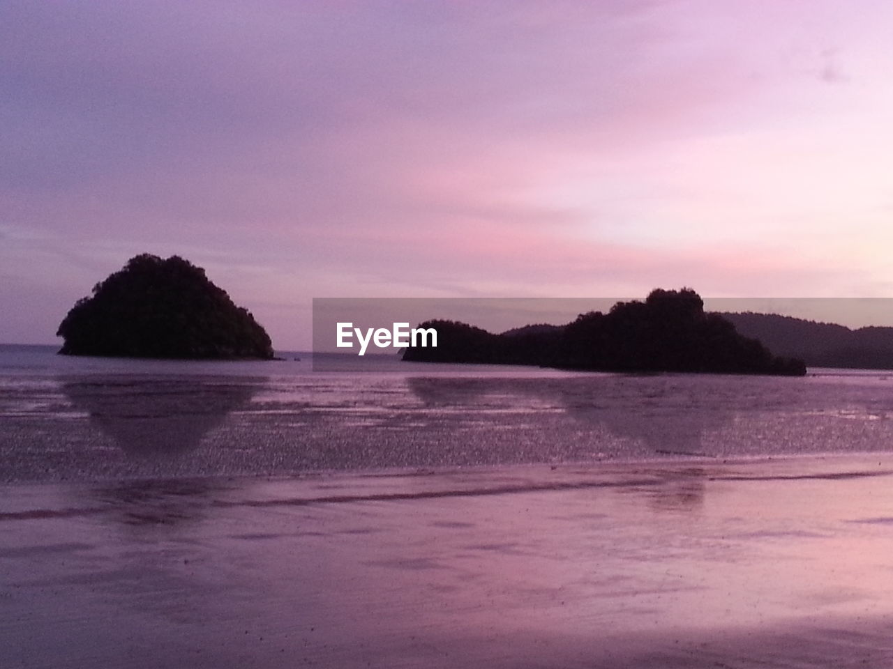 SCENIC VIEW OF SEA DURING SUNSET